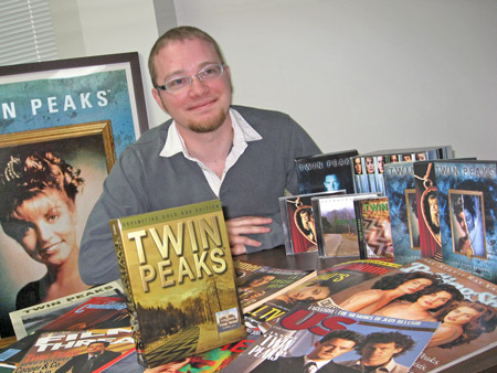 Photo of Jared with various Twin Peaks merchandise.